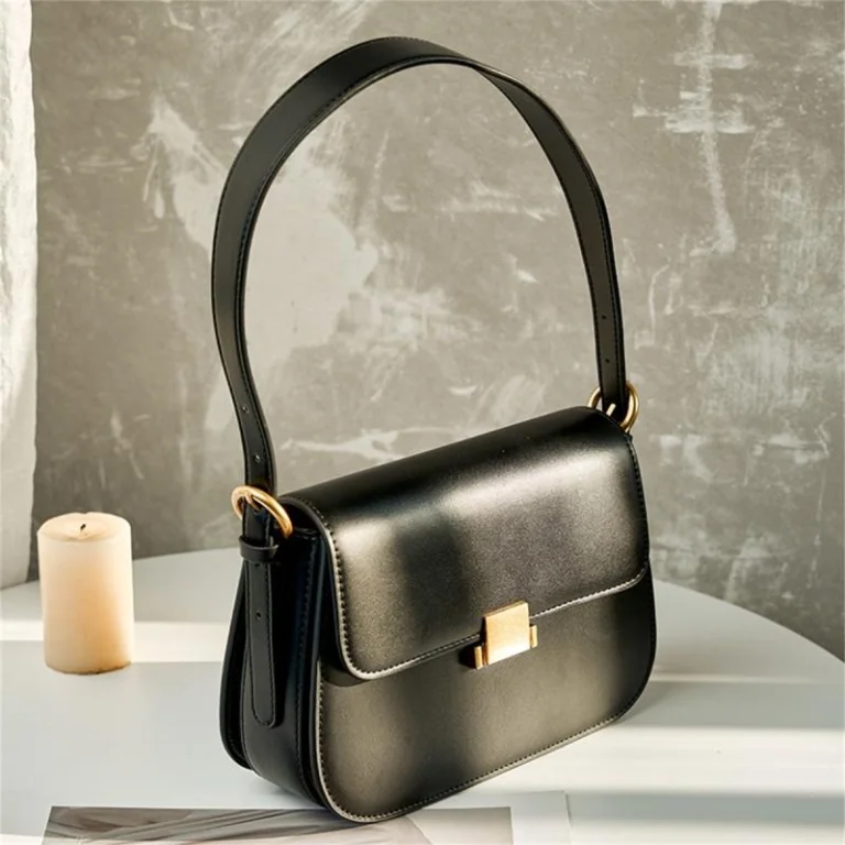 Black leather square shoulder bag with flap closure